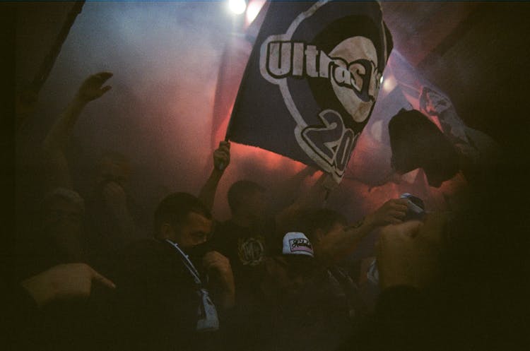 Sports Fans Waving Flags