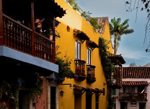 Free Charming colonial houses in Cartagena with colorful facades and wooden balconies. Stock Photo