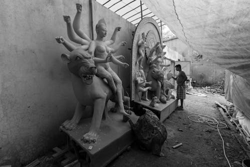 Sculptures of a Kali Goddess in a Workshop