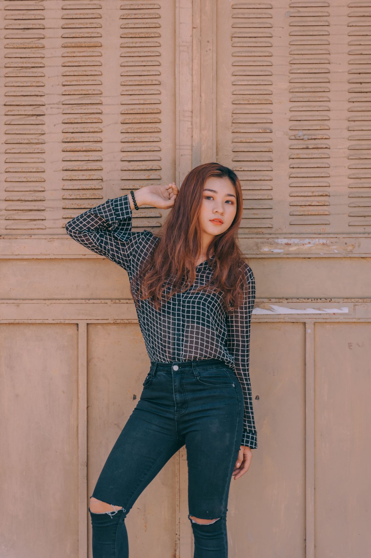 Relaxed editorial portrait of a young woman