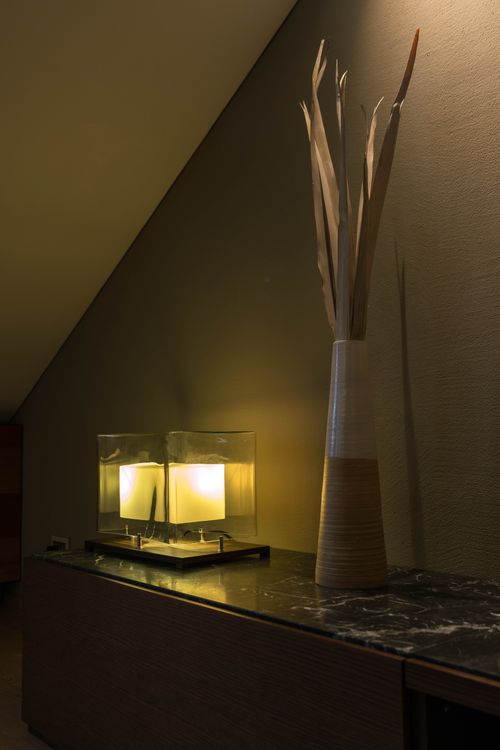 Free Warmly lit interior showcasing modern decor with ambient lighting for a cozy atmosphere. Stock Photo