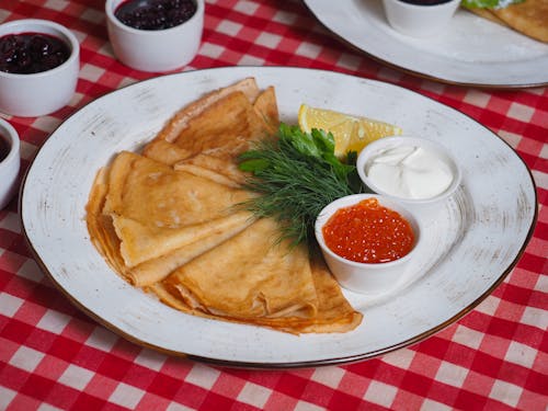 Foto d'estoc gratuïta de blini, caviar, crema agra