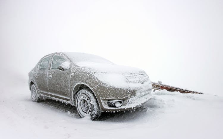 Frozen Car In Full Winter Meteo Conditions 