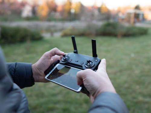 Základová fotografie zdarma na téma chytrý telefon, detail, drone létání