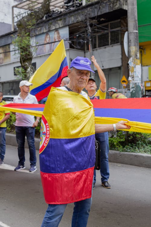 Ilmainen kuvapankkikuva tunnisteilla kolumbia, lippis, lippu