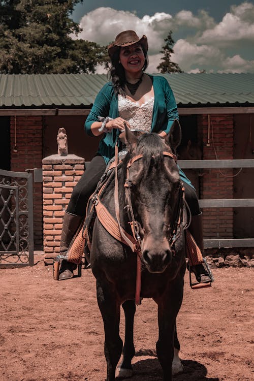A Woman Riding a Horse