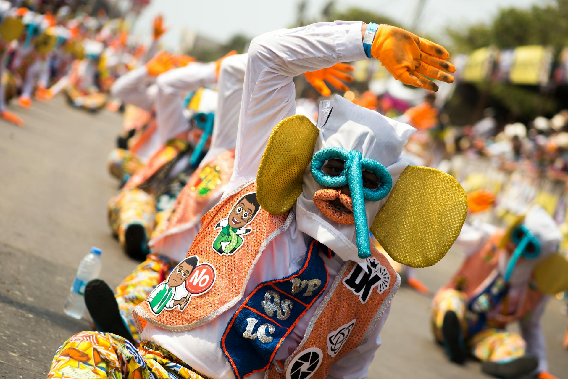 Colorful street performance with costumed dancers at Barranquilla Carnival, Colombia.