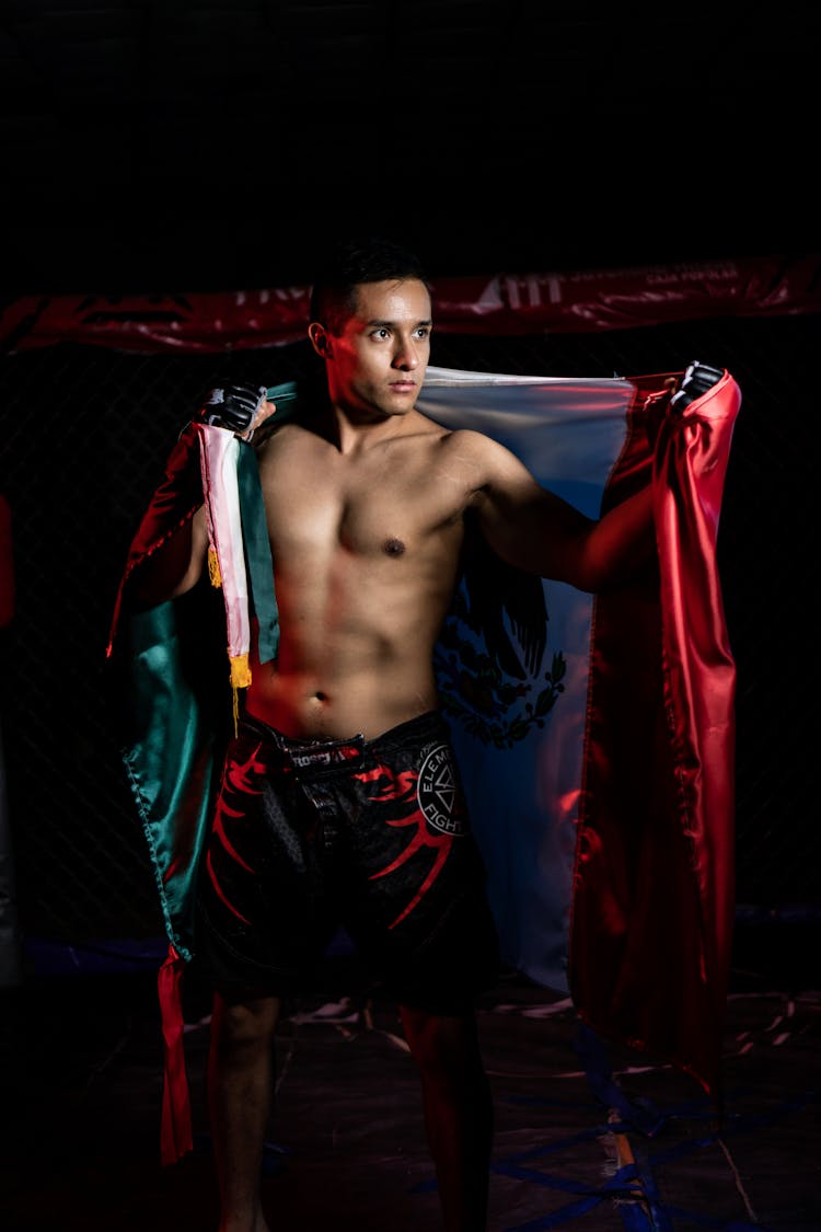 A Proud Fighter Holding His Mexican Flag