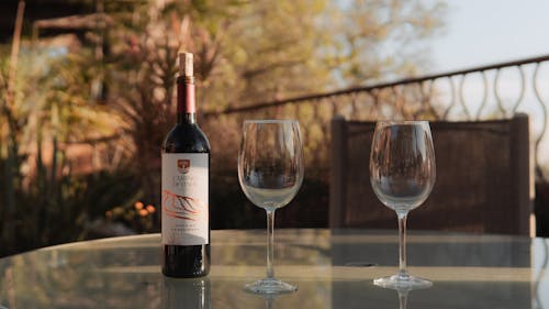 Wine Bottle and Wine Glasses on the Table