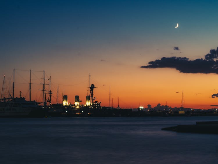 A Ship In Port At Dusk