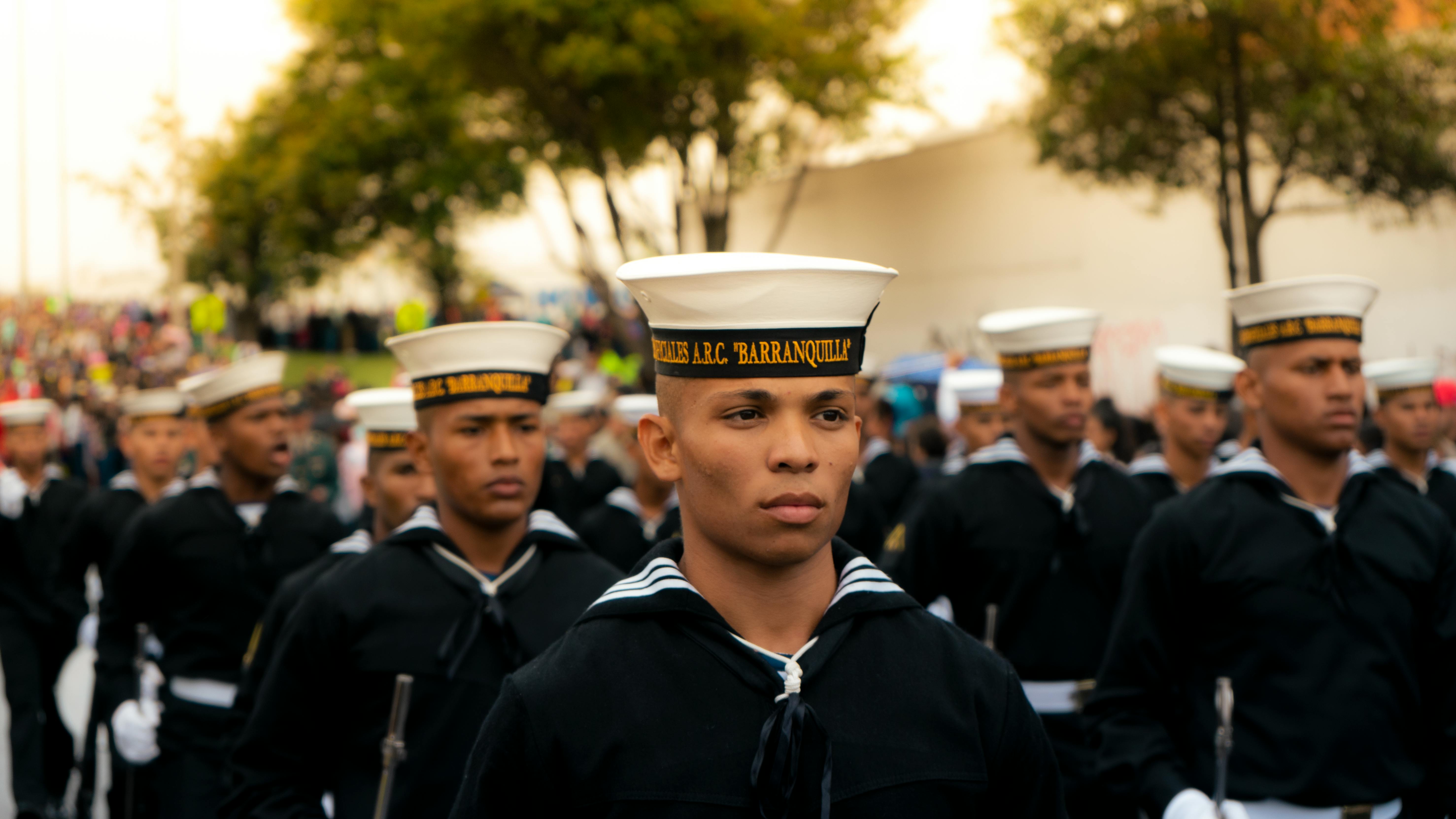Sailors in uniform marching during a parade in Bogotá, Colombia.