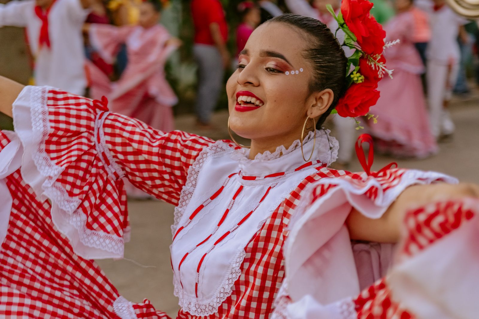 Dance instructor demonstrating a simple merengue side-step for beginners