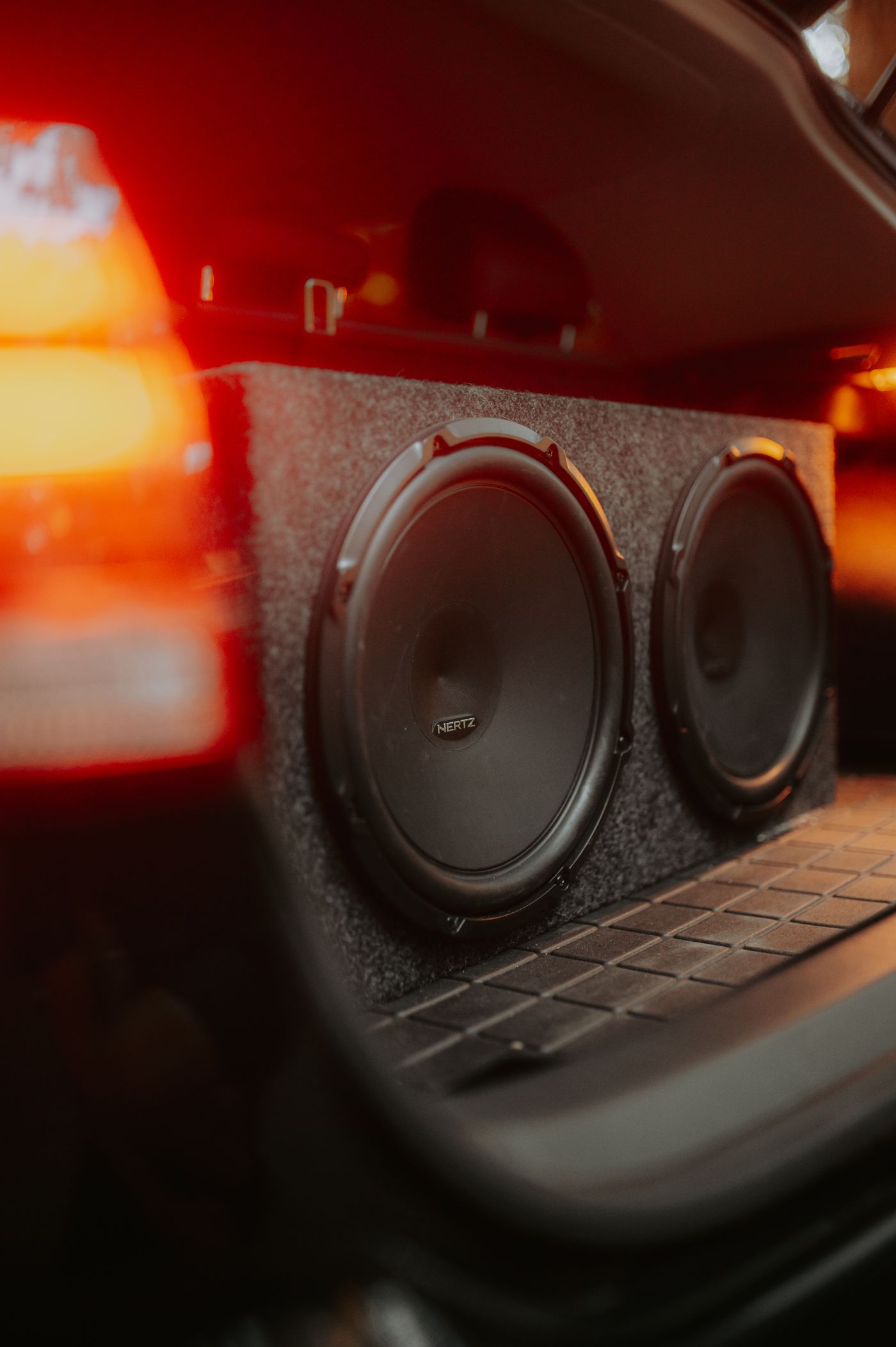 Twin subwoofers installed in the boot of a car