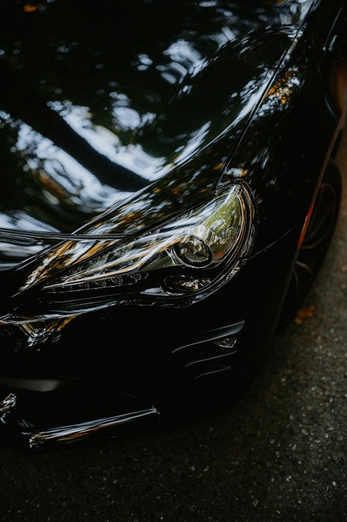 Headlight of a Black Car