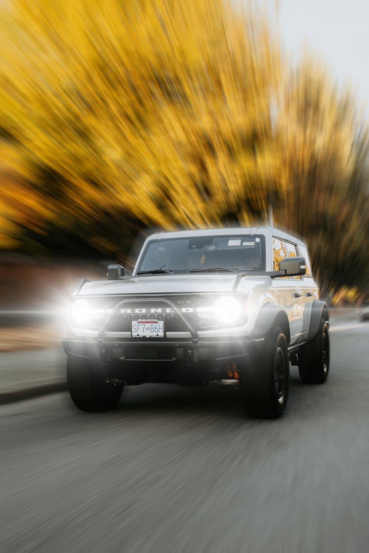 Ford Bronco On A Street In Blurred Motion 