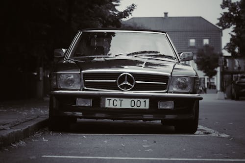 Grayscale Photo of Mercedes Benz Car