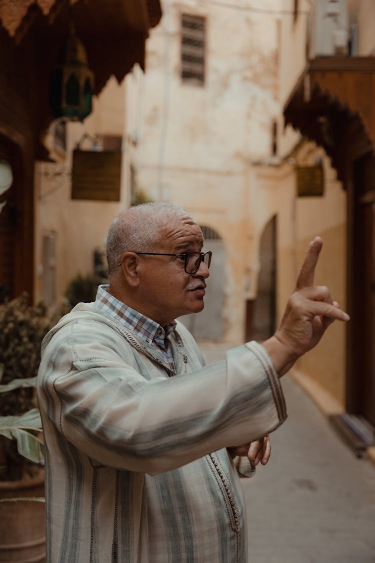 Man Gesturing While Talking