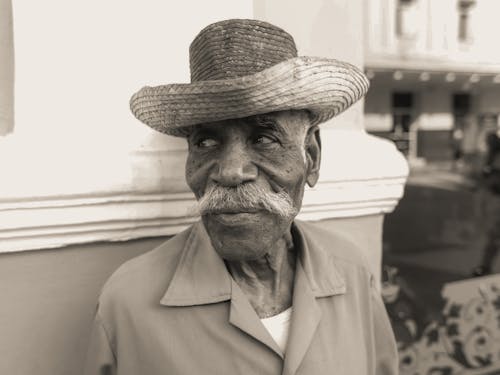 Senior Man Wearing a Woven Hat