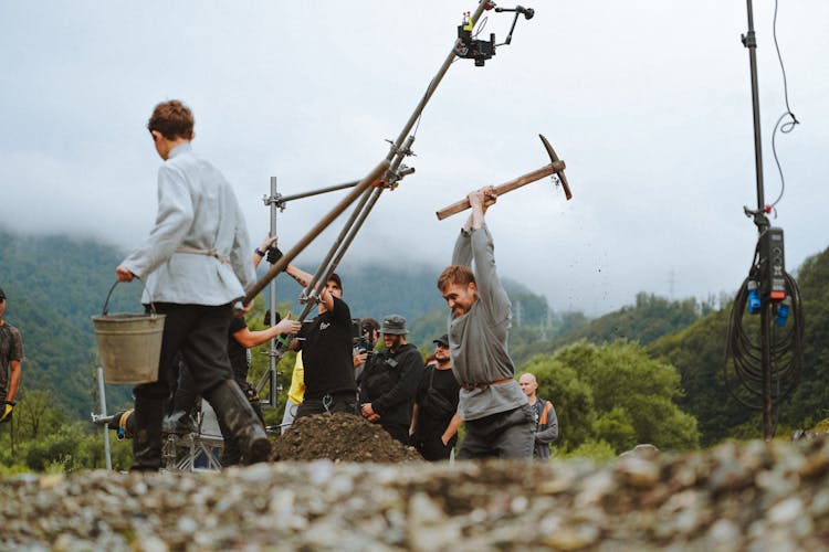 Actors And The Film Crew Filming In Mountains 