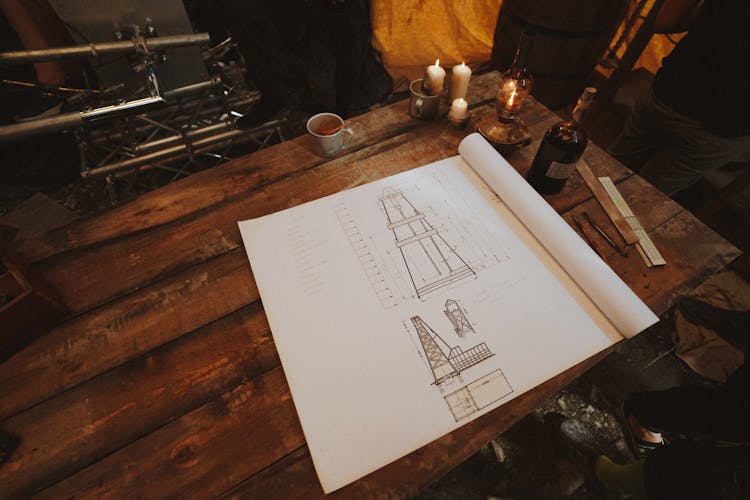 Architecture Construction Drawing On A Wooden Table 