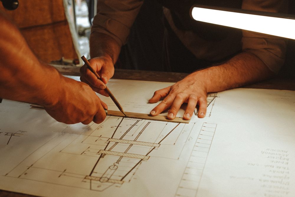 BIM consulting team reviewing architectural drawings together