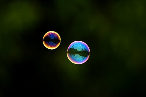 Foto d'estoc gratuïta de bombolles, flotant, fons verd