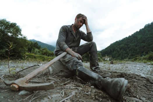 Tired Miner Sitting