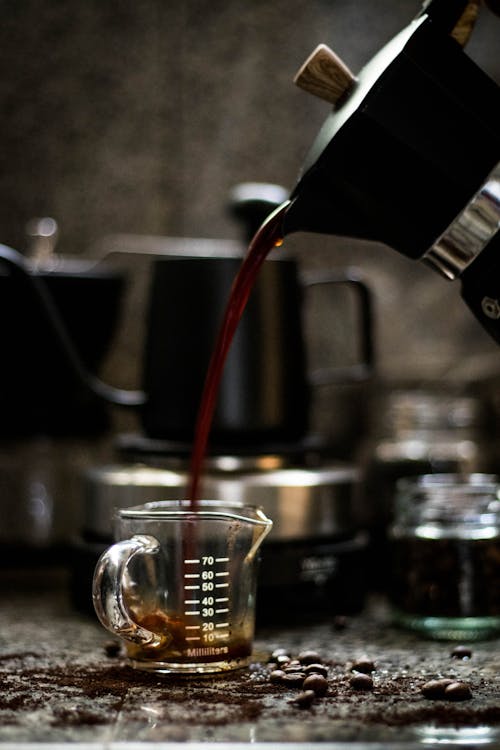 Free A Close-Up Shot of a Coffee being Poured from a Moka Pot Stock Photo