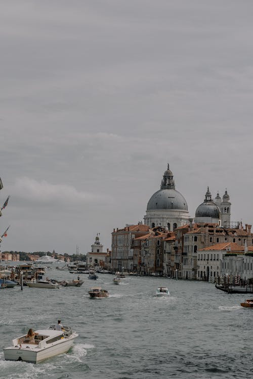 Boats on the Grand Canal and the View on Santa Maria della Salute, Venice, Italy