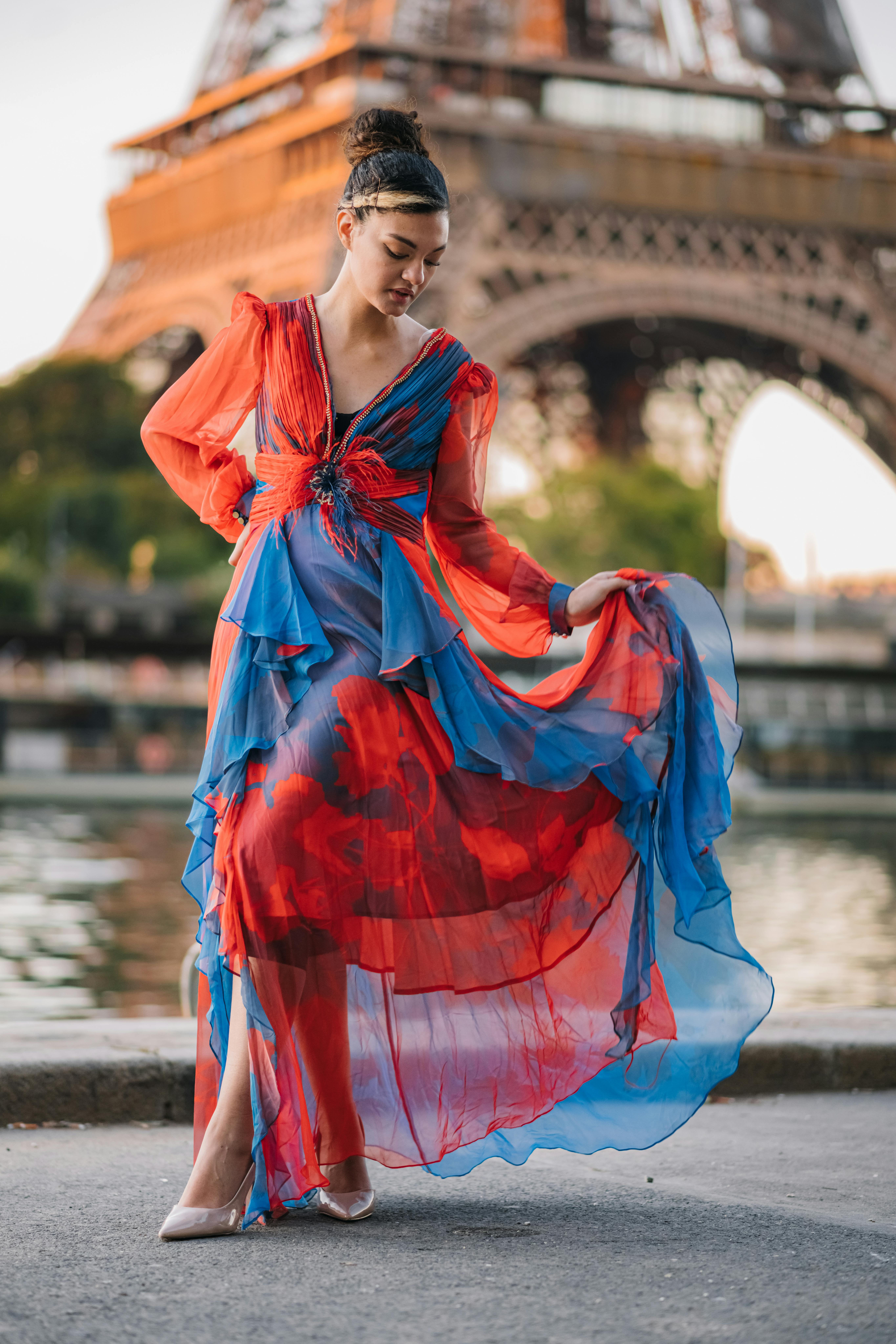 A Woman Wearing a Red and Blue Dress in Paris · Free Stock Photo
