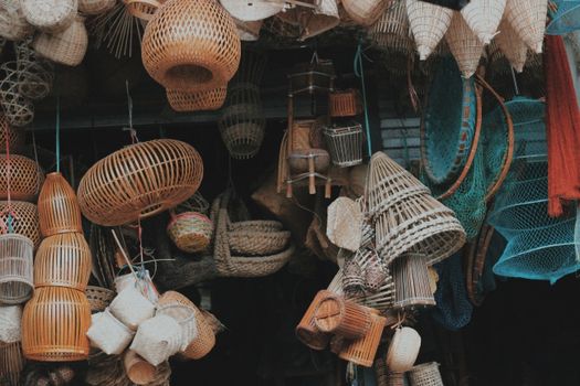 Discover a vibrant display of traditional Vietnamese bamboo crafts in a Hanoi market.