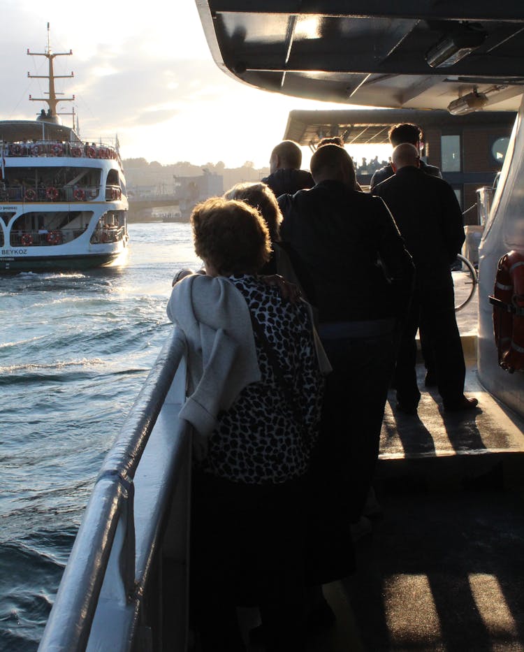 People Riding A Ferry