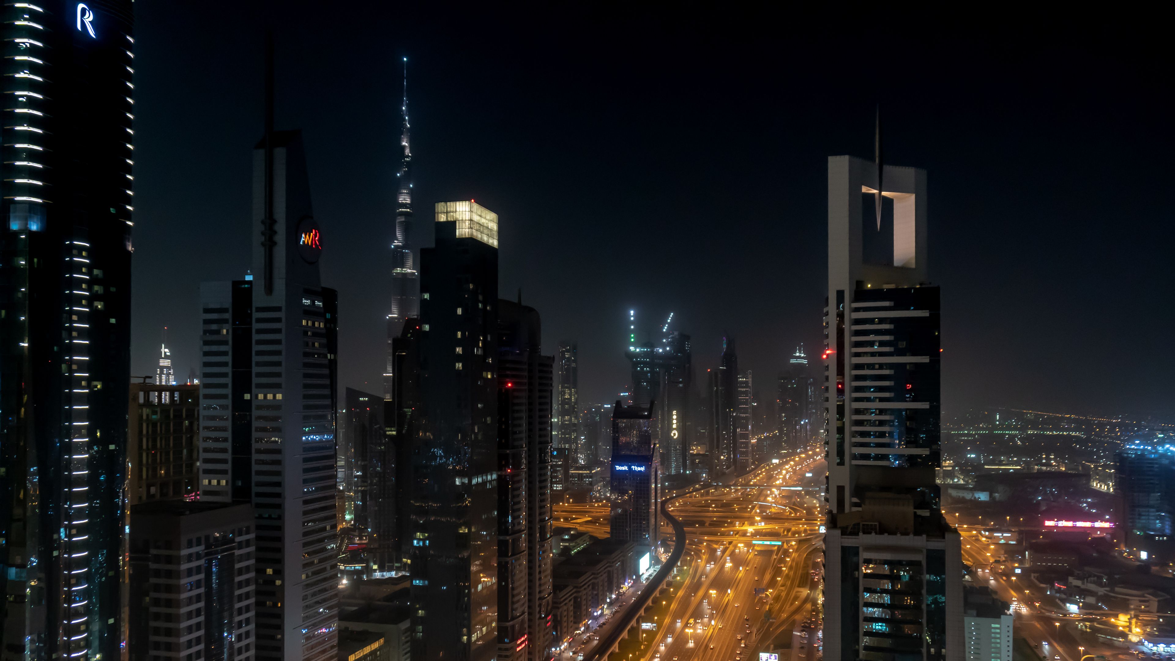 Explore Dubai's breathtaking night skyline featuring iconic skyscrapers like the Burj Khalifa.