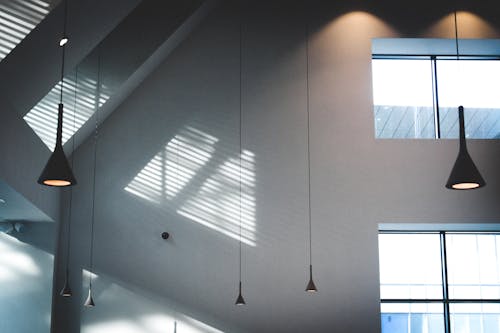 Black Pendant Lamps in White Building