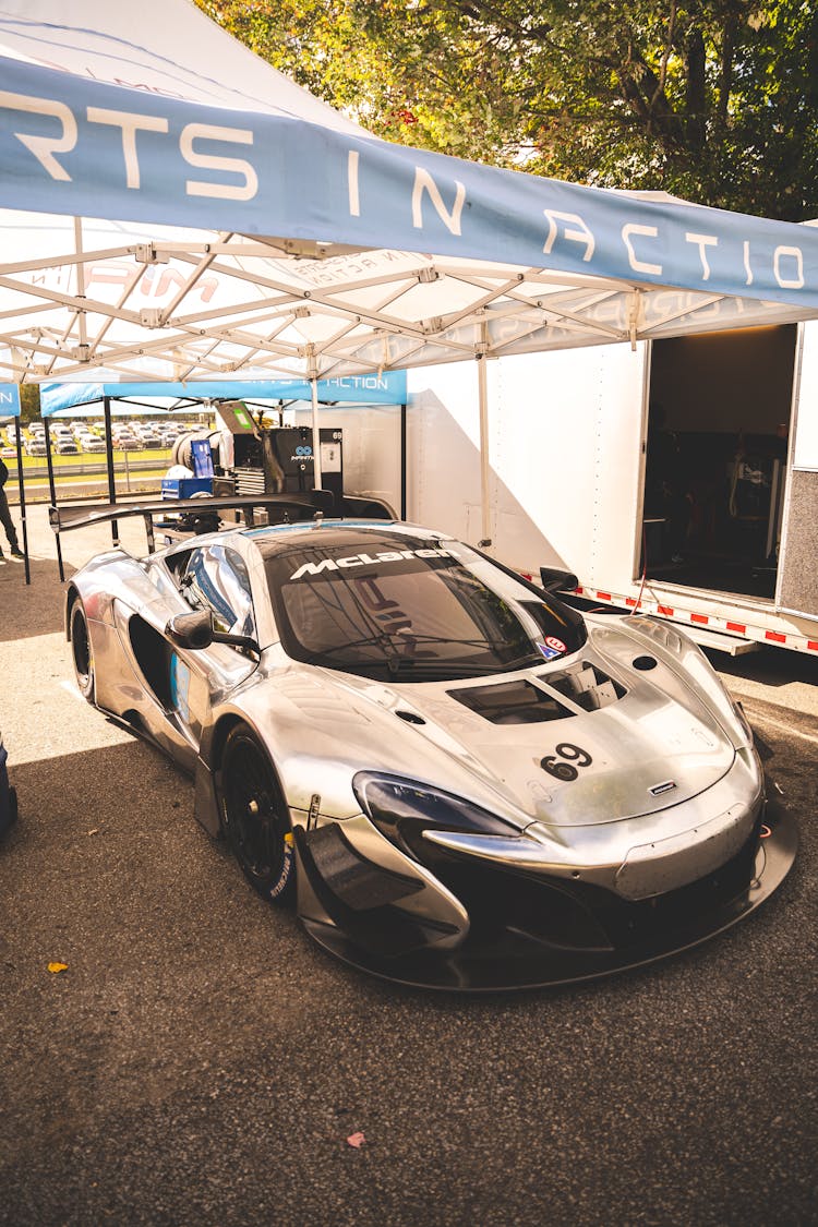 A Parked McLaren P1 GTR Under A Tent