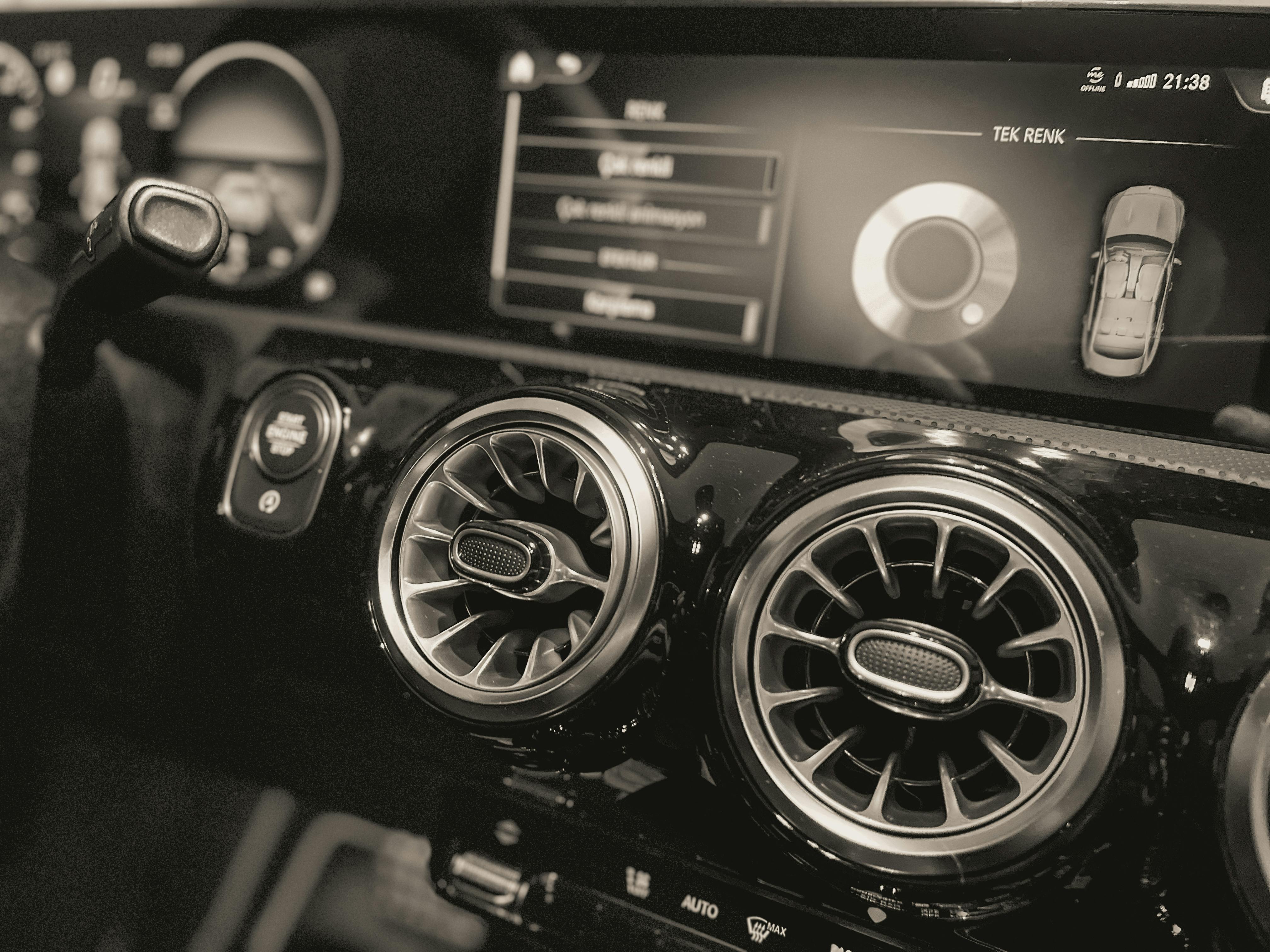 the head unit and aircon vents of a mercedes benz car