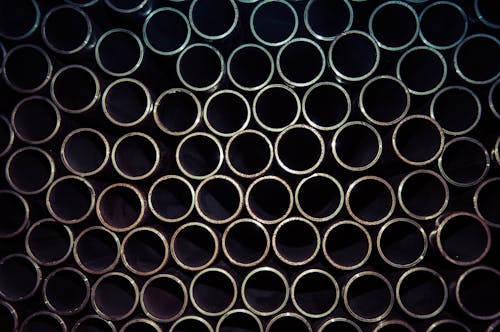 Close Up Photo of Gray Metal Pipes