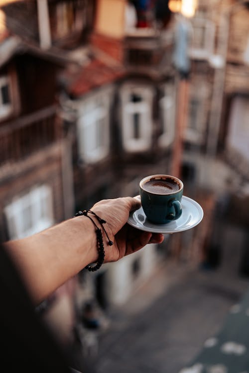 Free A Person Holding a Cup of Hot Chocolate Stock Photo