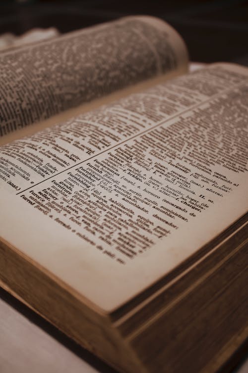 Close-Up Photo of Pages of an Old English-Spanish Dictionary