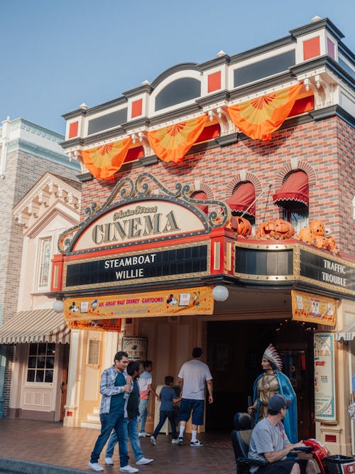 People at the Entrance of Main Street Cinema