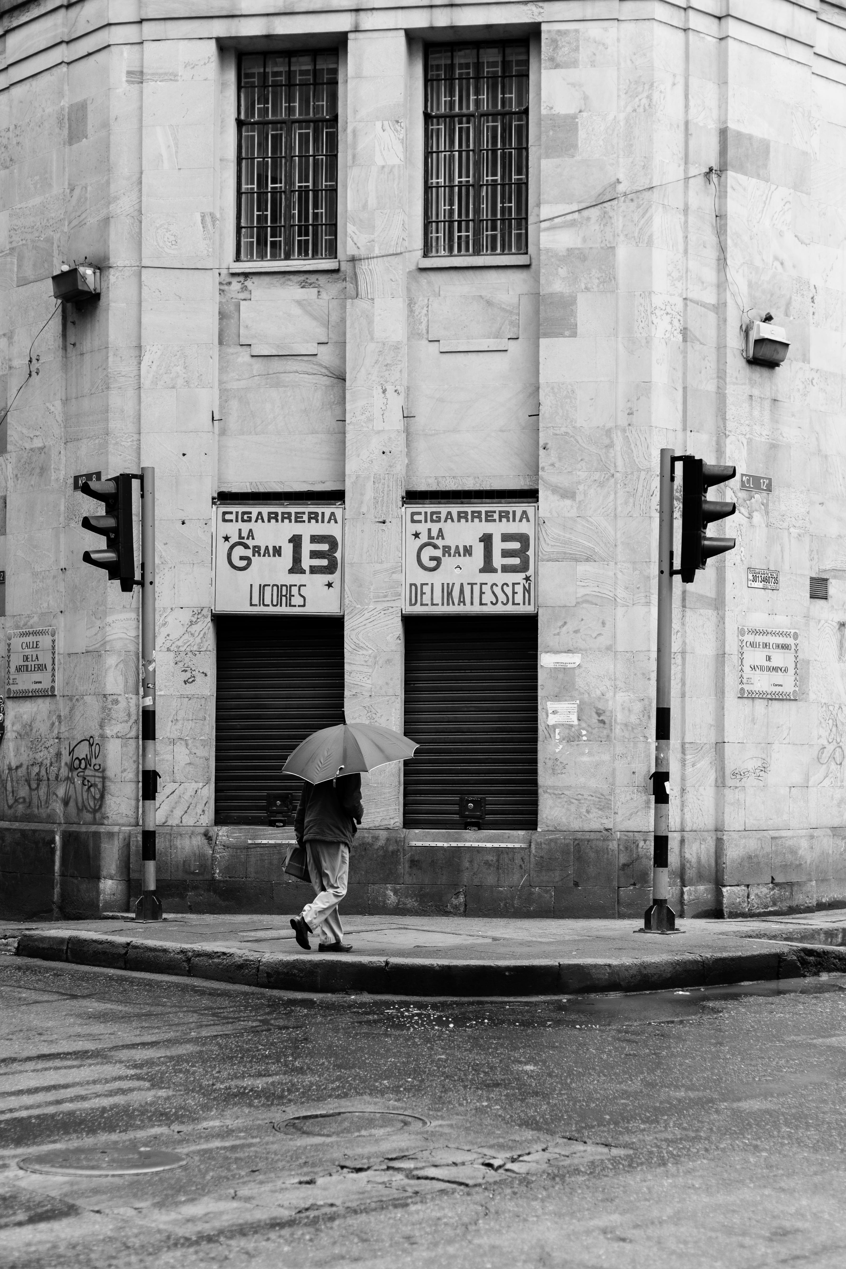 Grayscale Photography of People Walking Near Buildings · Free Stock Photo