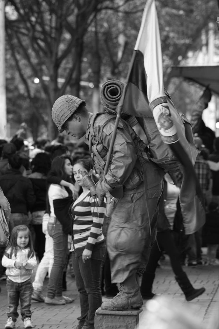 Soldier With Flag In Black And White