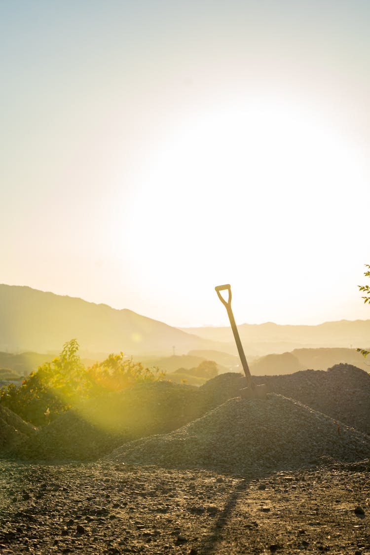 Shovel On Pile Of Gravel