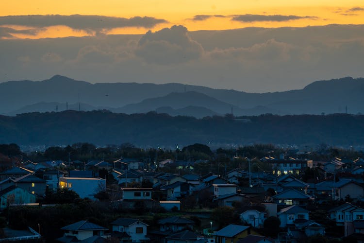 Silhouettes Of Mountains At Dusk