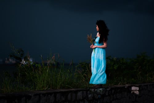 Woman Wearing Light-blue Strapless Dress 