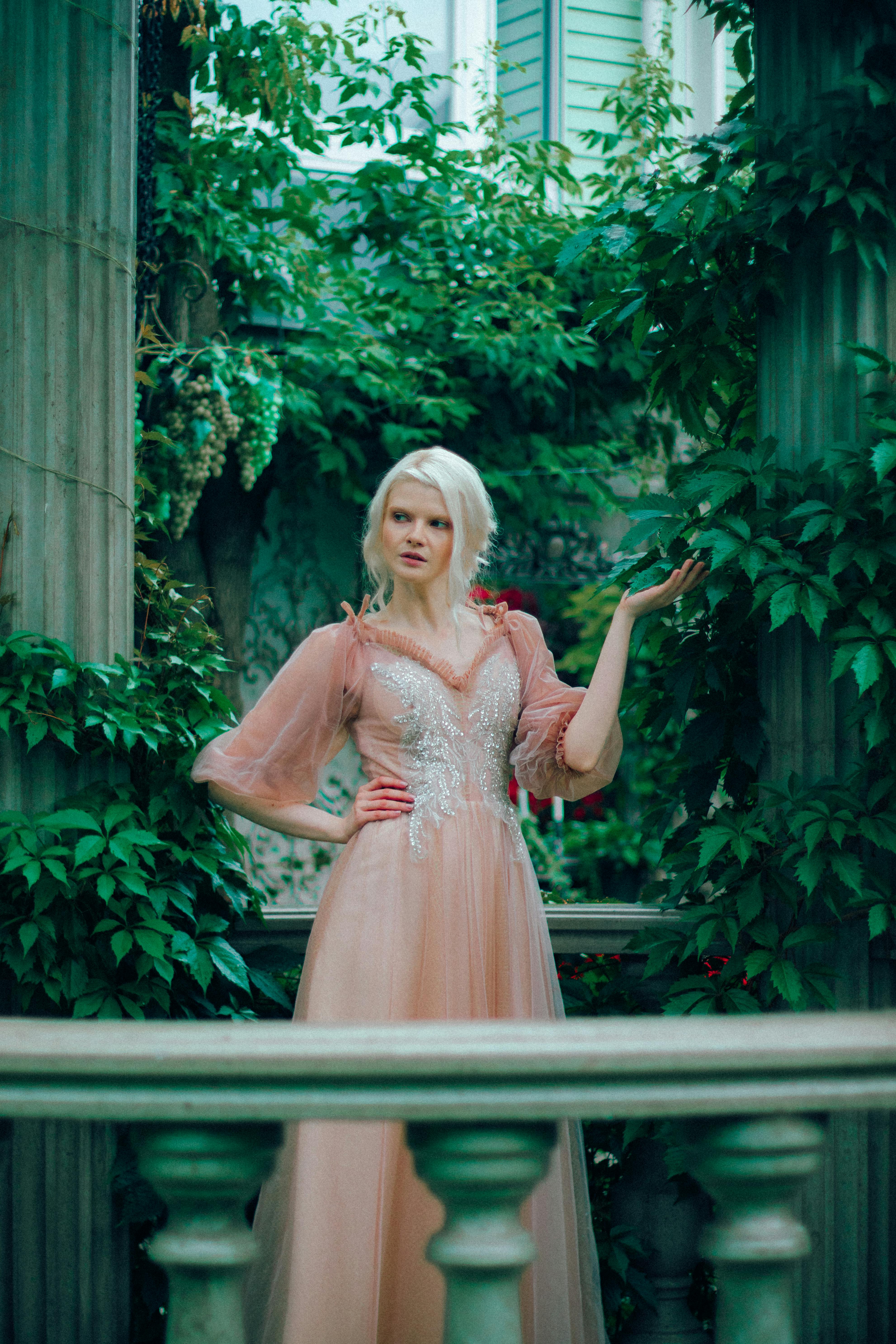 woman in a beautiful tulle dress in a garden