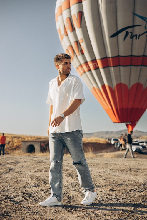 Man on the Background of a Hot Air Balloon in Cappadocia 