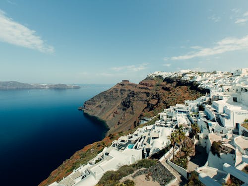 Foto d'estoc gratuïta de aigua, edificis, litoral