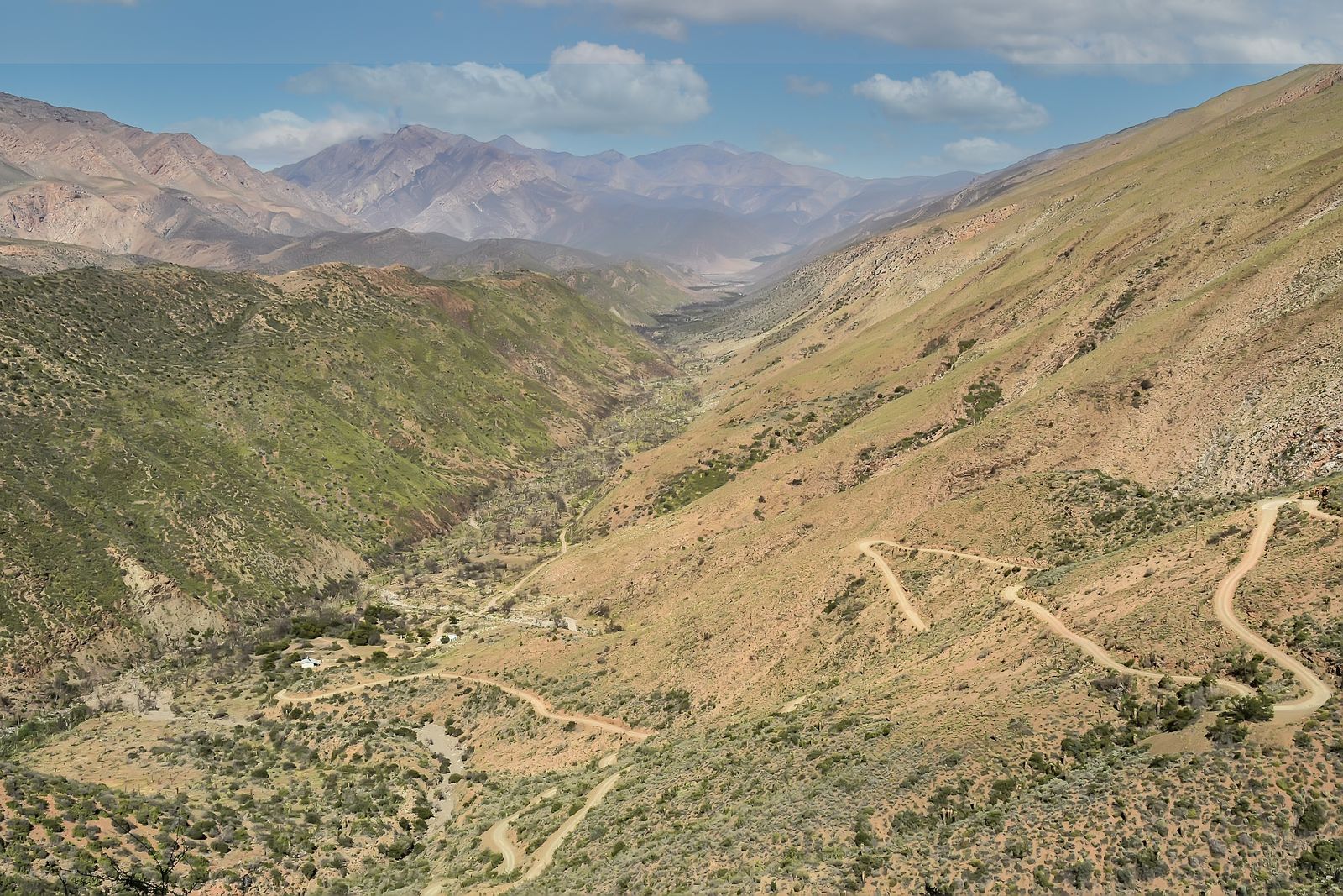 South African mountain pass winding road and valley landscape