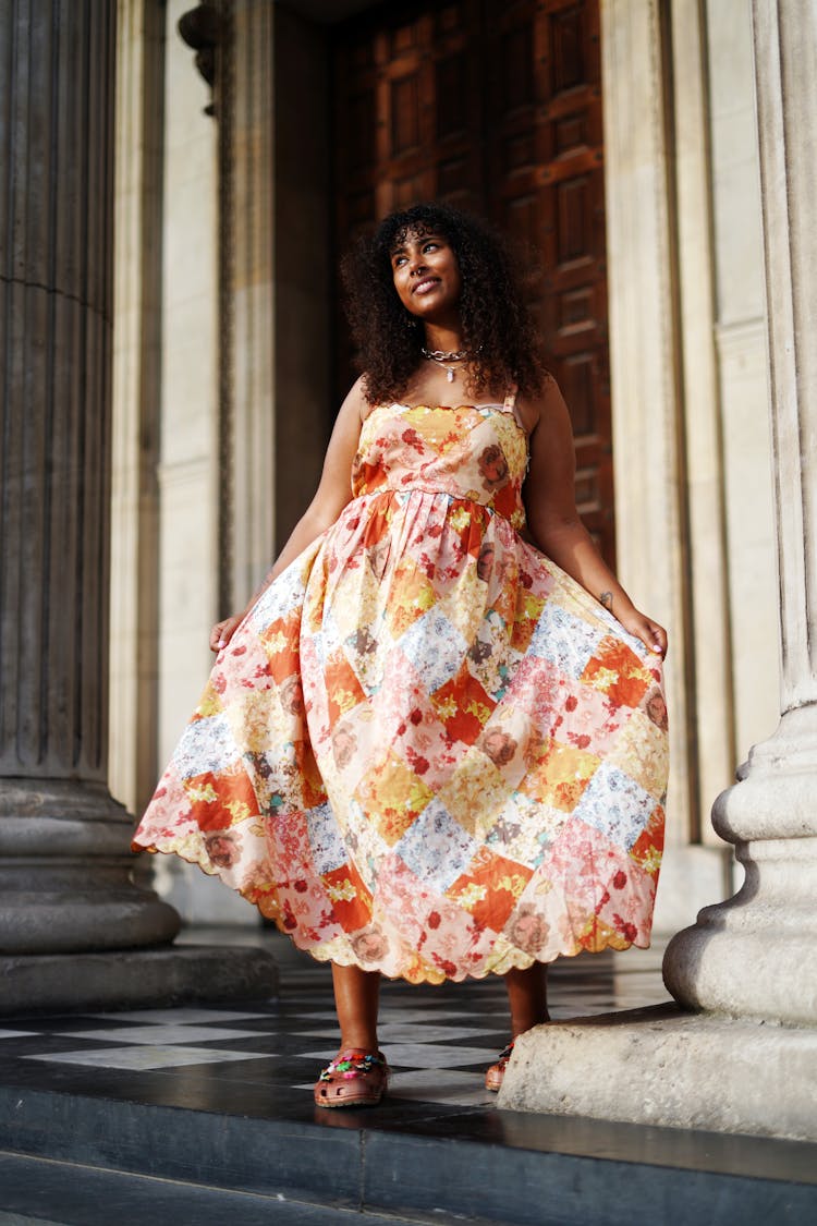 Woman In A Beautiful Floral Dress